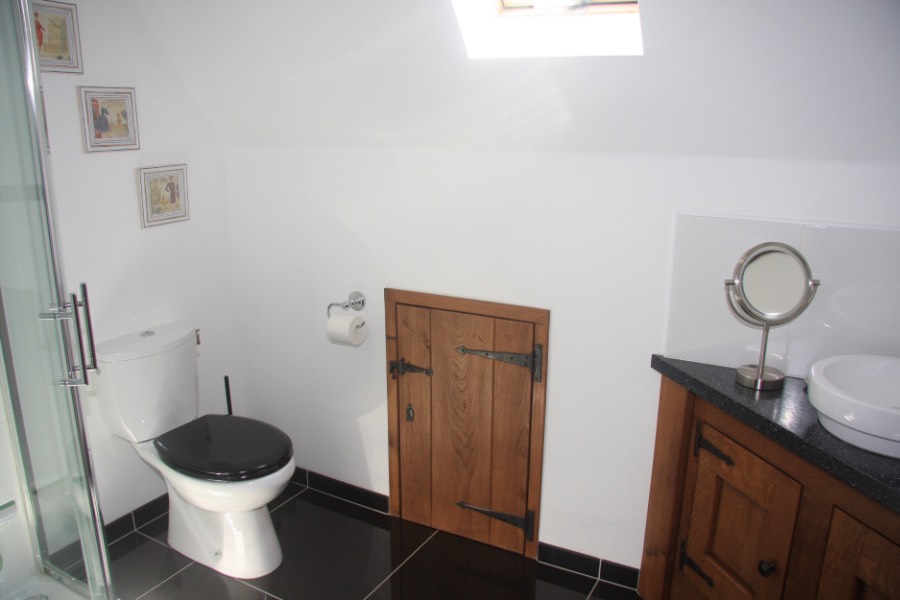 Orchard bedroom ensuite bathroom with toilet